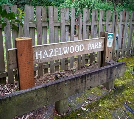 A wooden sign that reads 
